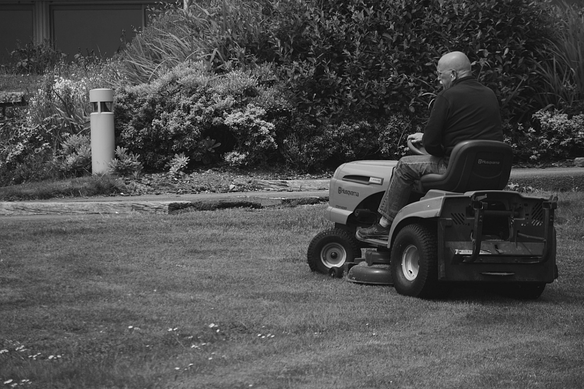 lawn mowing worker